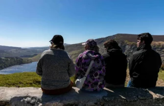 Sitting on Wall at Guinness Lake
