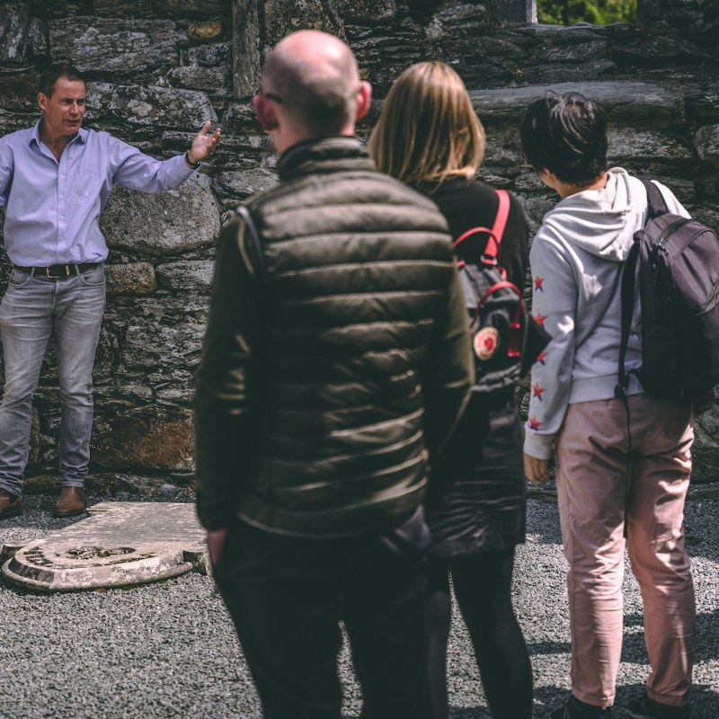 people listening the tour guide