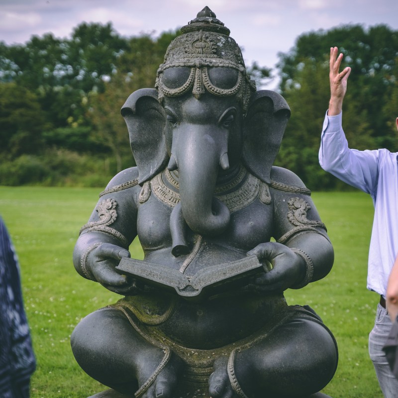 tour guide near a popular statue