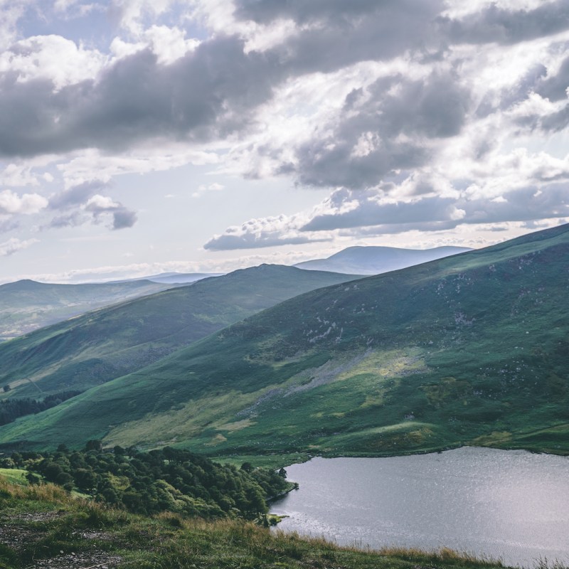 The owner seated enjoying the lake views